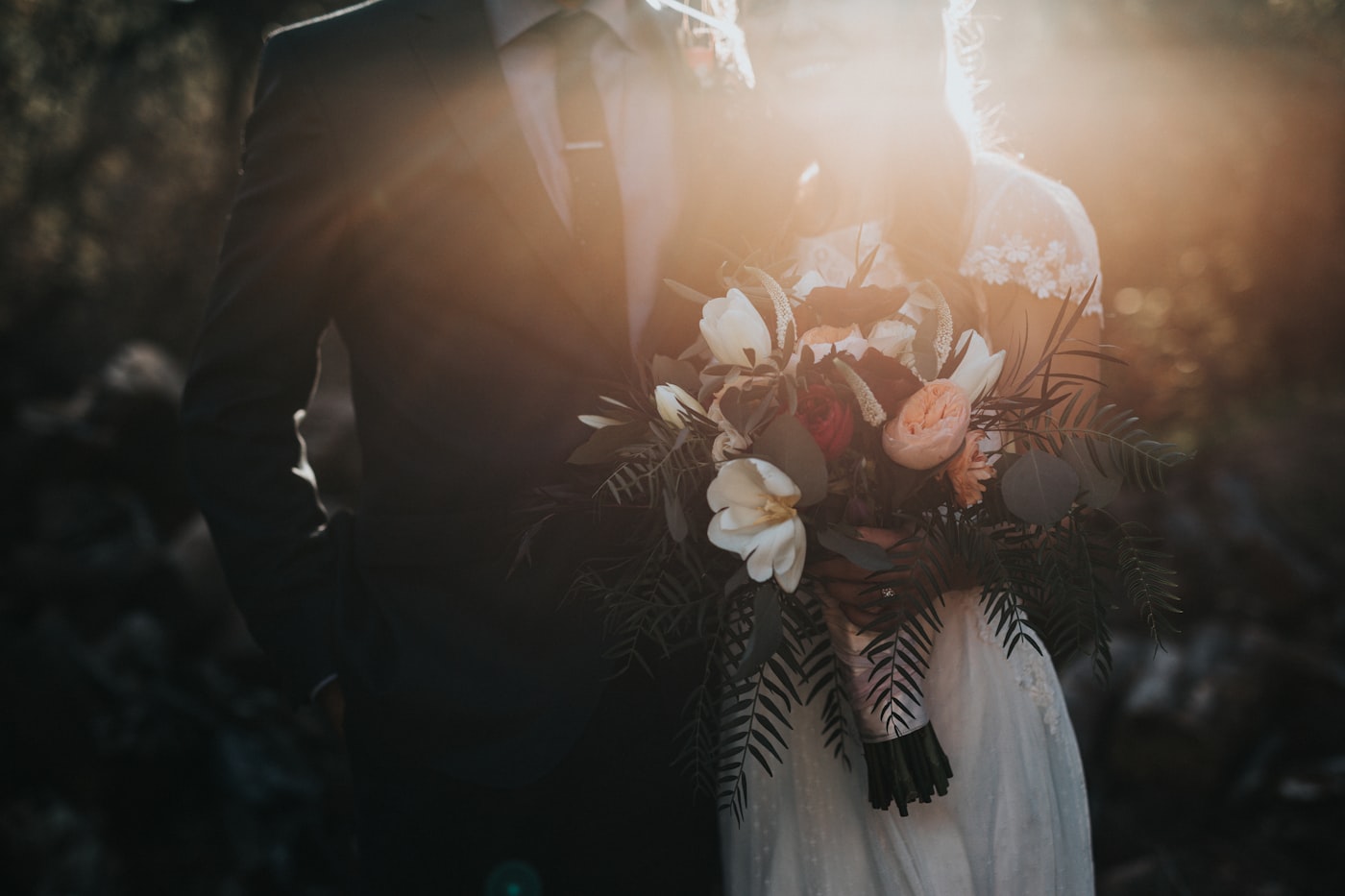 Example private story website cover — a couple sharing a wedding moment
